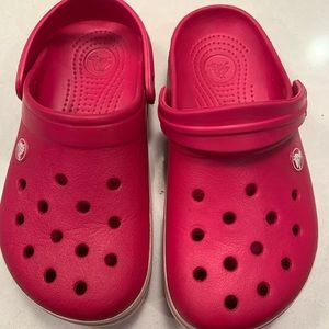 Pink crocs
